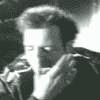 heuradys: hugh dillon licking his hand from the headstones cemetery video - animated (hugh hand)