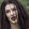 heuradys: photo of daisy from higher ground with black lipstick and fangs (bite me)