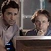 heuradys: photo of carson & radek from atlantis with an H on the wall behind them (Carson & Radek H)