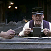 addams: (Playing with his trains again)