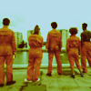 binz: the cast of the misfits lines up, viewed from the back, looking out over their city. ([ misfits ] get in line)