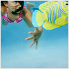 betonprosa: Girl swimming with Angelfish in foreground (weightless)