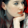 metonymy: Anna Popplewell with her chin in one hand, face in profile. (susan: chin)