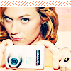 shopfront: Source: One Tree Hill. Peyton aiming a camera at the screen, raised eyebrow. (OTH - I see in photos clicky click)