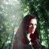 shopfront: Source: Merlin. Morgana in the woods, a hood over he head. (M - [Morgana] magic and destiny)