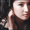 su_li: Su Li leaning forward, touching her ear (listening)