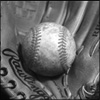 ghoti: black and white baseball in glove (baseball)