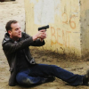 out_of_time: Jack's on the ground, pointing a gun (Down not out)