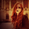 onceamy: An angst-ridden red head displays her woe in the street. (Girl-6)