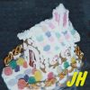 justhuman: Gingerbread house covered in colorful candy (gingerbread)