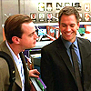 justhuman: Tony smiling at Tim in the office (tony-tim)