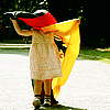 monanotlisa: little girl in football shoes, her head tangled in a german flag (deutschland)