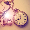 untonuggan: image of an antique gold pocket watch with a pink flower (time)