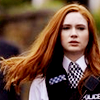 st_aurafina: Amy in her police uniform, with swishy hair (DW: Amy Pond)