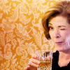 goodbyebird: Arrested development: Lucille is holding a drink and winking. (AD wink wink nudge nudge)