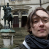 joan_psmith: me in camelot (pierrefonds castle) in front of _the_ stairs (me in camelot)