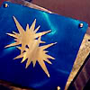zippitgood: two stars merged on metallic blue background (Default)