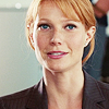 handing: (subtle smile)