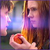 laurashapiro: The Doctor grab's Amy's hand as she holds the apple (amy and eleven)
