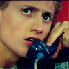 jaynells: bill, from bill and ted, looks scared while holding a phone. (freaked out bill)