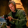 abyssinia: Slightly unfocused Jack cleaning his P-90 in a cargo ship (SG1 - Jack unfocused)