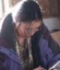 fatoudust: Photo of Lisa from Burnt Corn on Navajo reservation, writing in journal (journal)