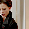 elaineofshalott: Lara Pulver as Irene Adler in BBC's "Sherlock", in dark trench coat, eyes closed (The Woman)
