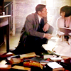 tree: jack and phryne sitting on the floor surrounded by books ([missfisher] just business)