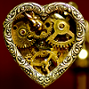 actionreaction: photo of a heart, steampunk style, made with cogs and gears ([steampunk] clockwork heart)
