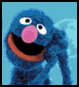 metahacker: A picture of the muppet Grover, looking happy (happy)