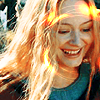 cadenzamuse: Eowyn smiling, wreathed in golden light (Eowyn: golden smile)
