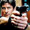 esteefee: Shep pointing his Beretta at the camera. (big_gun)