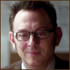 esteefee: Harold Finch smiling smugly. He's in a brown suit with brown glasses frames to match. (smug_finch)