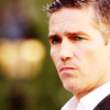 freeholding: John Marcone, frowning slightly, eyebrows knit together (hrm 8()