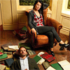 scintilla10: Joan sits in a chair; Sherlock lies at her feet surrounded by books (Elementary - Joan is clearly the alpha)