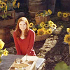 grlnamedlucifer: Doctor Who's Amy, surrounded by sunflowers ([who] :D?)