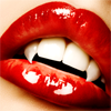alwayswondered: A closeup of a vampire's mouth showing fangs, wearing red lipstick. (I wanna do bad things with you.)