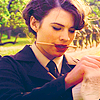 muccamukk: Peggy holds a pencil between her teeth and studies a clipboard. (Cap: Preoccupied)