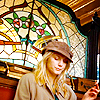 mary: A picture of a woman sitting in front of a stained glass window, from Tarantino's Inglourious Basterds ([misc] modern saint)