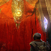 hokuton_punch: Art of someone in space marine armor looking up at a glowing alien artifact draped in red. (marathon alien awe)