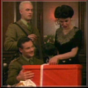 brightknightie: Janette and Nick giving the red-wrapped firetruck to Daniel. (Gift)