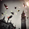 unveiled: pigeons flying and lights against the backdrop of a clocktower (magic is in the air)