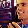 veleda_k: Neal from White Collar looking extremely happy while examining a currency plate (White Collar: Neal glee)