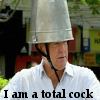 marginaliana: Jeremy clarkson wearing a tin pail on his head. Caption: "I am a total cock." (TG - Jeremy is a total cock)