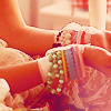 apocalypsesweet: From the Virgin Suicides, a pair of bandaged wrists covered in bracelets. (Default)