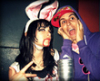 were_duck: Victoria in bunny ears with blood coming out of her mouth, next to Gabe in purple hoodie making a goofy face (Vicky and Gabe)