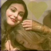 gamerchick: Kaylee resting her head on Inara's shoulder.  Both are smiling. (Inara/Kaylee)