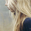 recessional: a blond woman in profile with her hair obscuring her face (writing; she was the wild ice queen)
