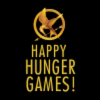florianschild: The mockingjay logo on a black background with the text "Happy Hunger Games!" in gold (happy hunger games!)