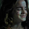 alt_hermione: Hermione, smiling through her tears. (smile through tears)